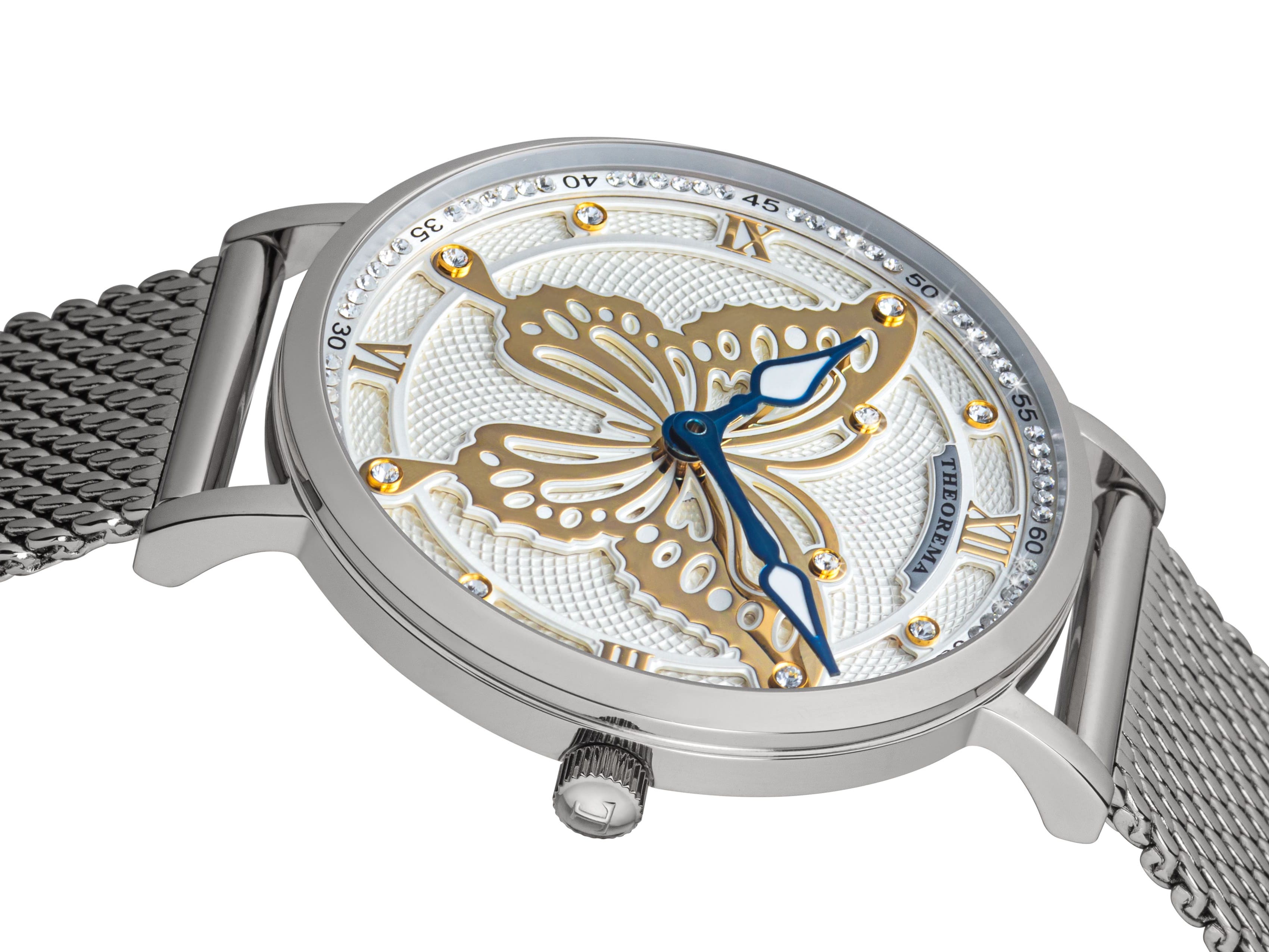 Multi tone dial with Swarovski crystals on it and two hands.