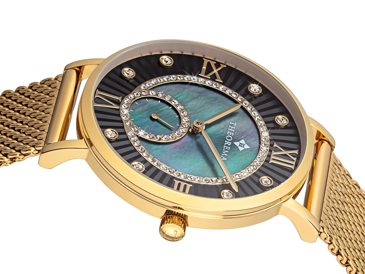 Close-up side view of the Theorema Aurora watch featuring a gold color case, a shimmering mother-of-pearl dial, Roman numerals in gold, and sparkling crystals outlining an elegant figure-eight subdial design.