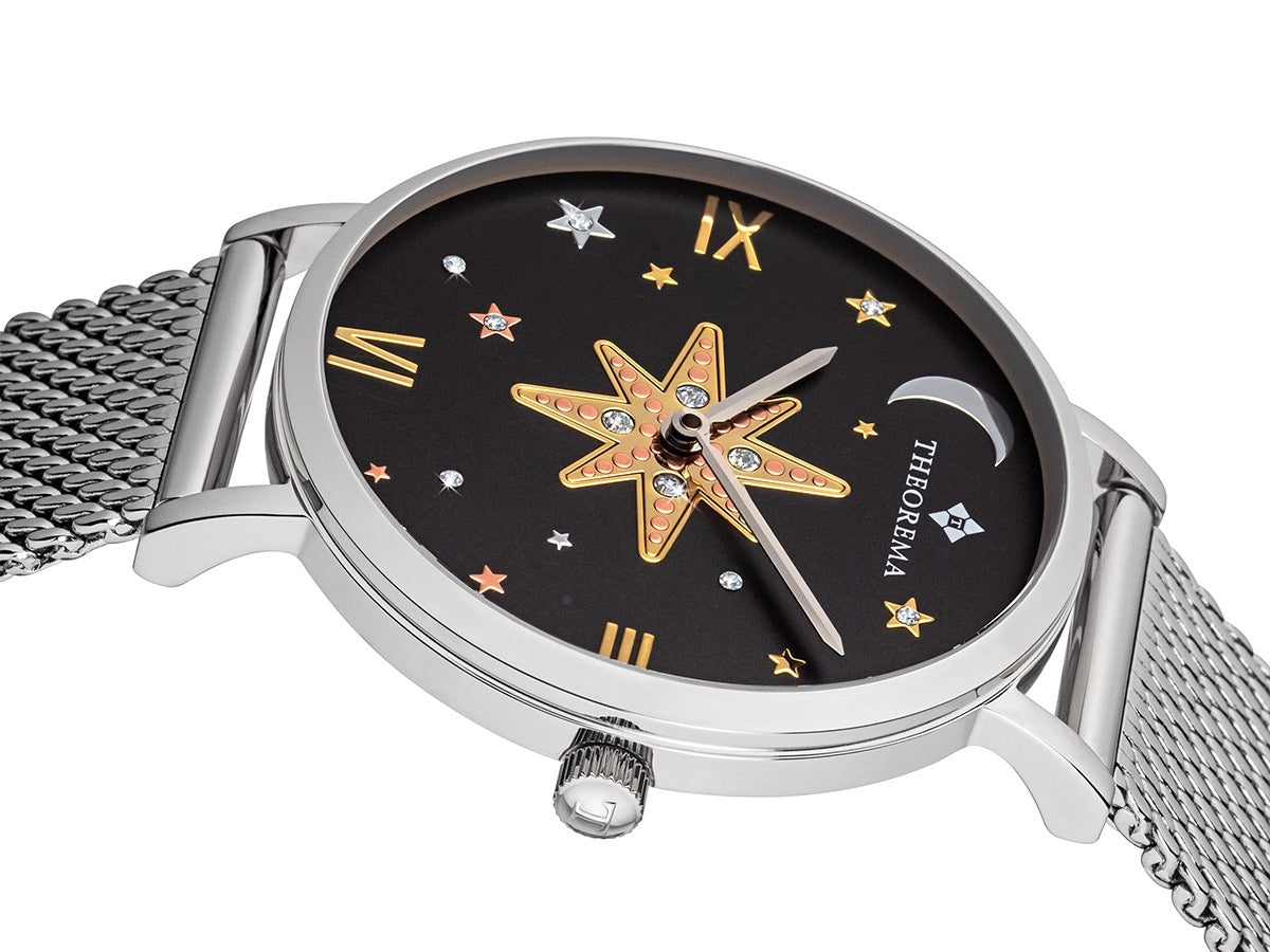 Black dial with Swarovski stars on it and stars along a moon at 11 a clock.