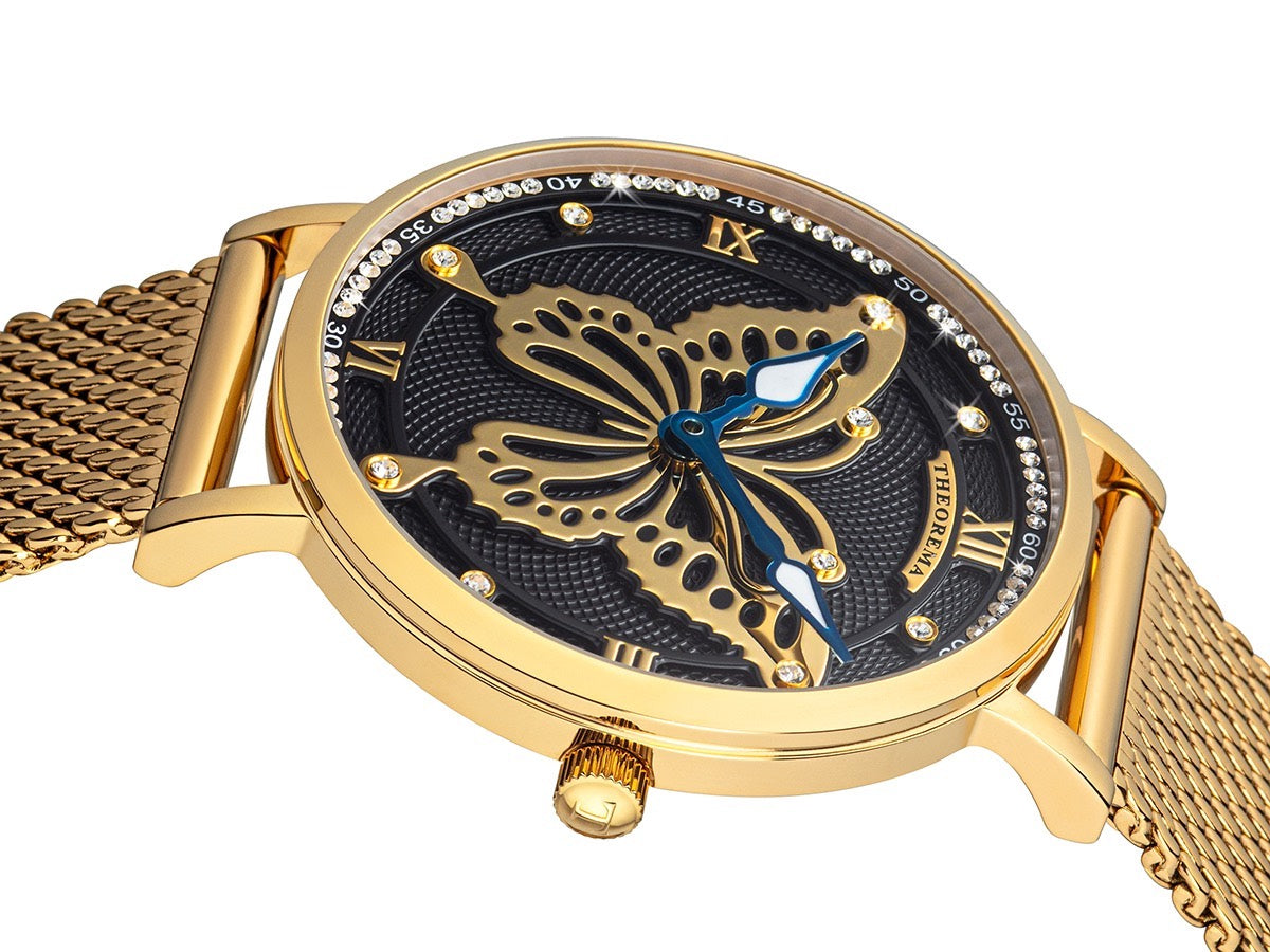 Black multi tone dial with Swarovski crystals on it and gold gold color butterfly in the middle.