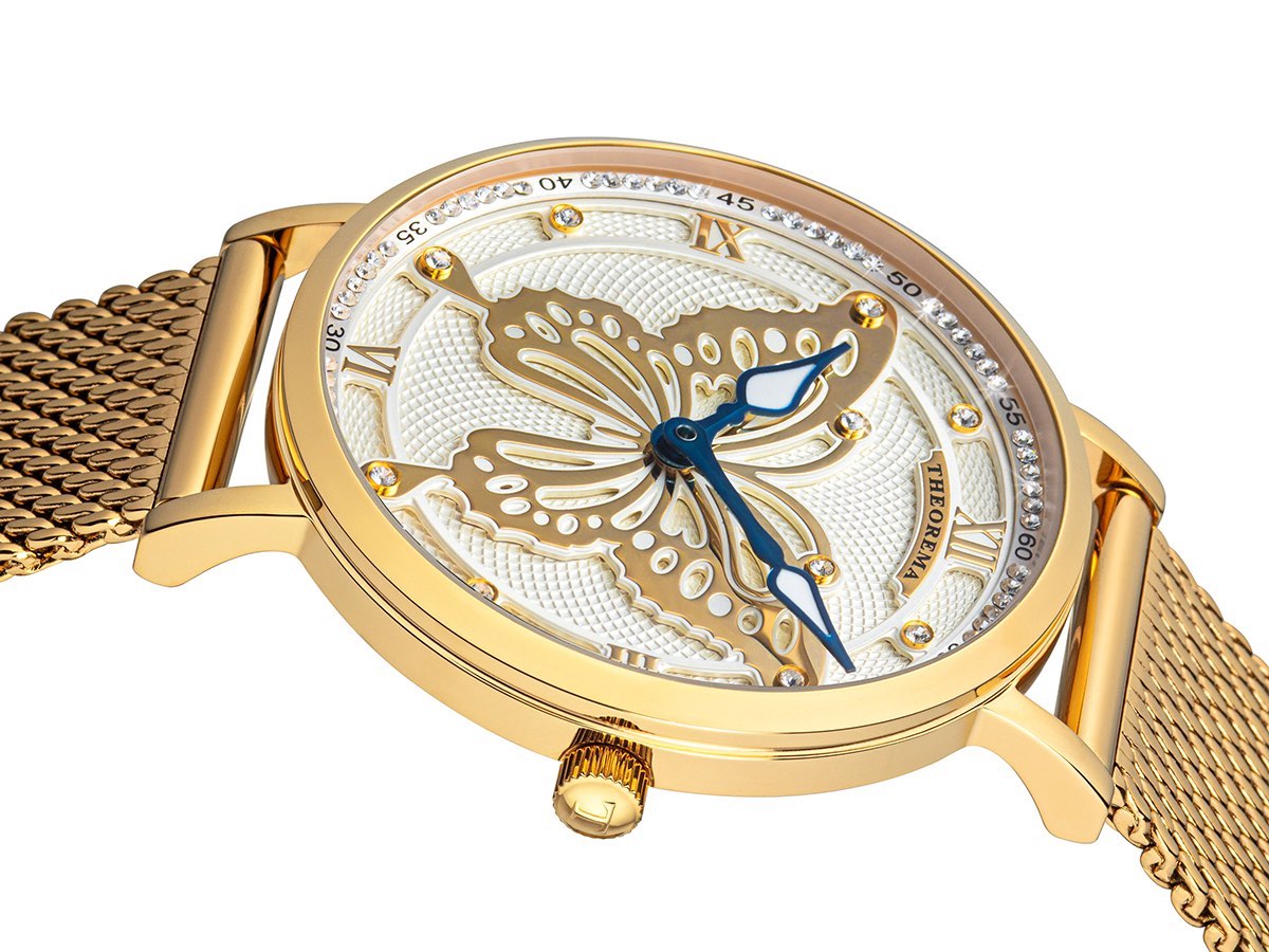 Two hands in a leaf shape with a big butterfly design in the middle of the dial.