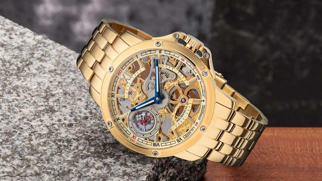Tufina Theorema Lagos, IPG gold plated watch for men, German skeleton watch with a mechanical movement, blue hands and a metal bracelet