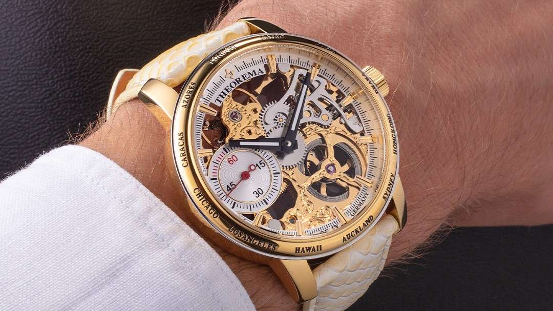 Tufina Theorema Toronto Mechanical Watch with a white leather band, gold case, skeleton dial 