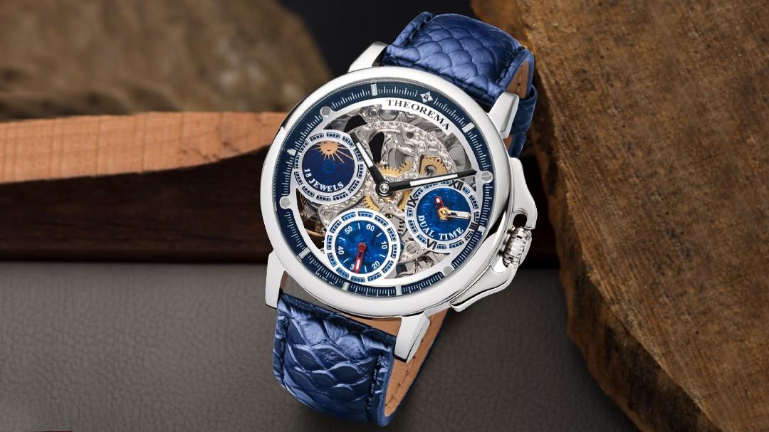 Buenos Aires Theorema mechanical watch with an engraved dial, dual-time function, Baton hands, silver case, blue leather band
