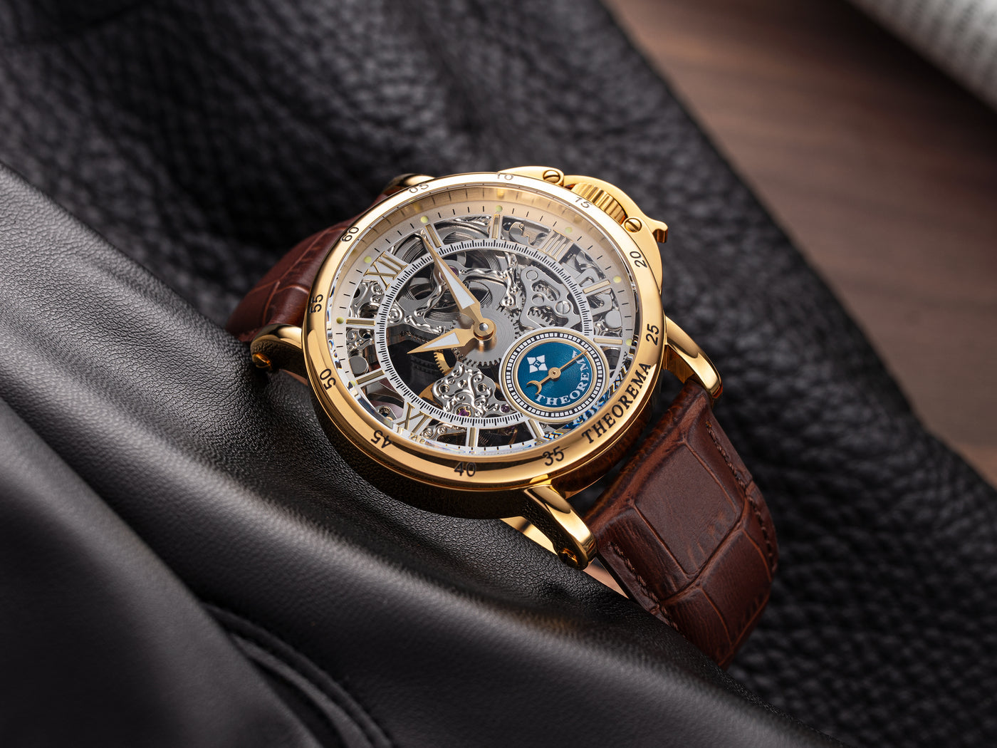 Tufina Pionier Malibu, automatic watch for men with 12 diamonds, a see-through skeleton dial, gold colored case and brown leather band