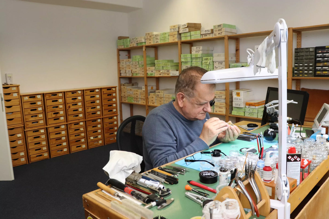 Tufina watchmaker expert during work. 