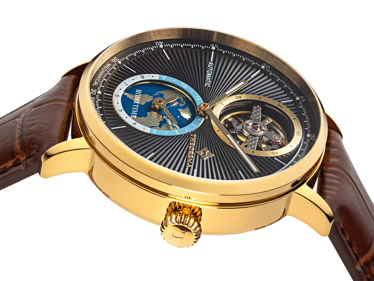 Black dial with open heart at 12 a clock and a map of the world at 6 a clock for dual-time.