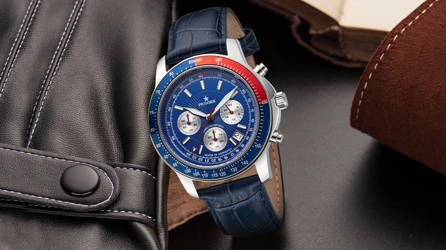 Blue face dial chronograph with three silver sub-dials.