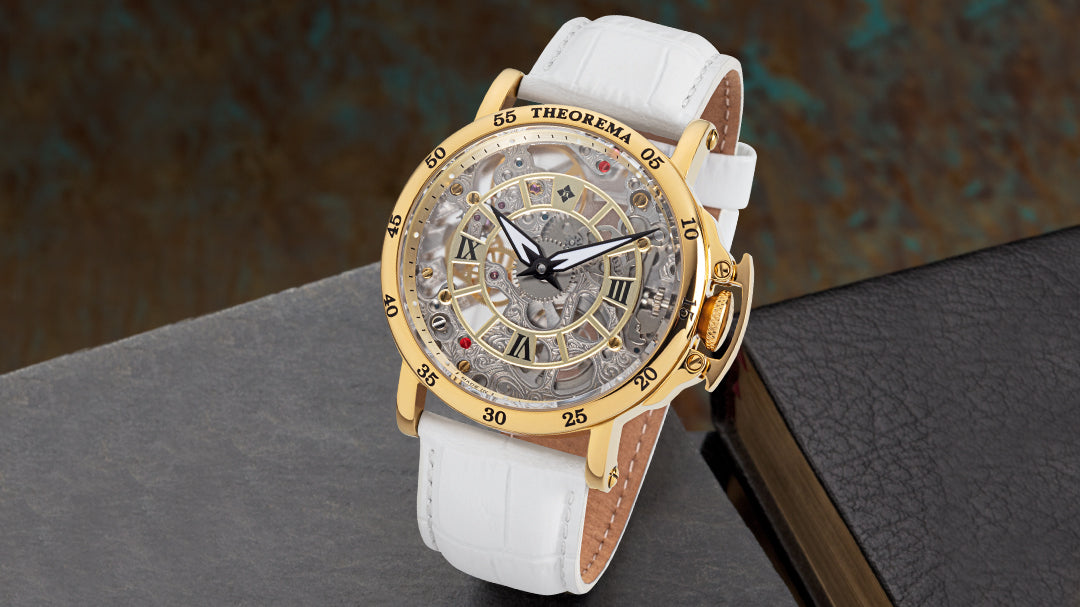 Photo showcasing the mechanical watch Made in Germany Sahara by Theorema in gold colors and white leather band