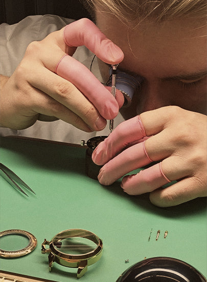 Tufina's watchmaker with a loop in his eye hand assembly process 