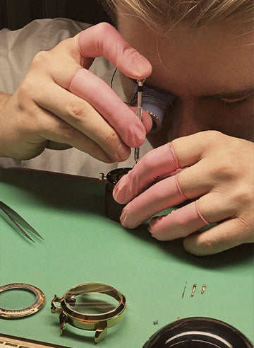 Tufina's watchmaker with a loop in his eye hand assembly process 