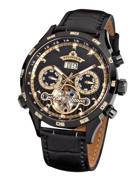 Automatic watch with black leather strap and gold detailed face on a white background.