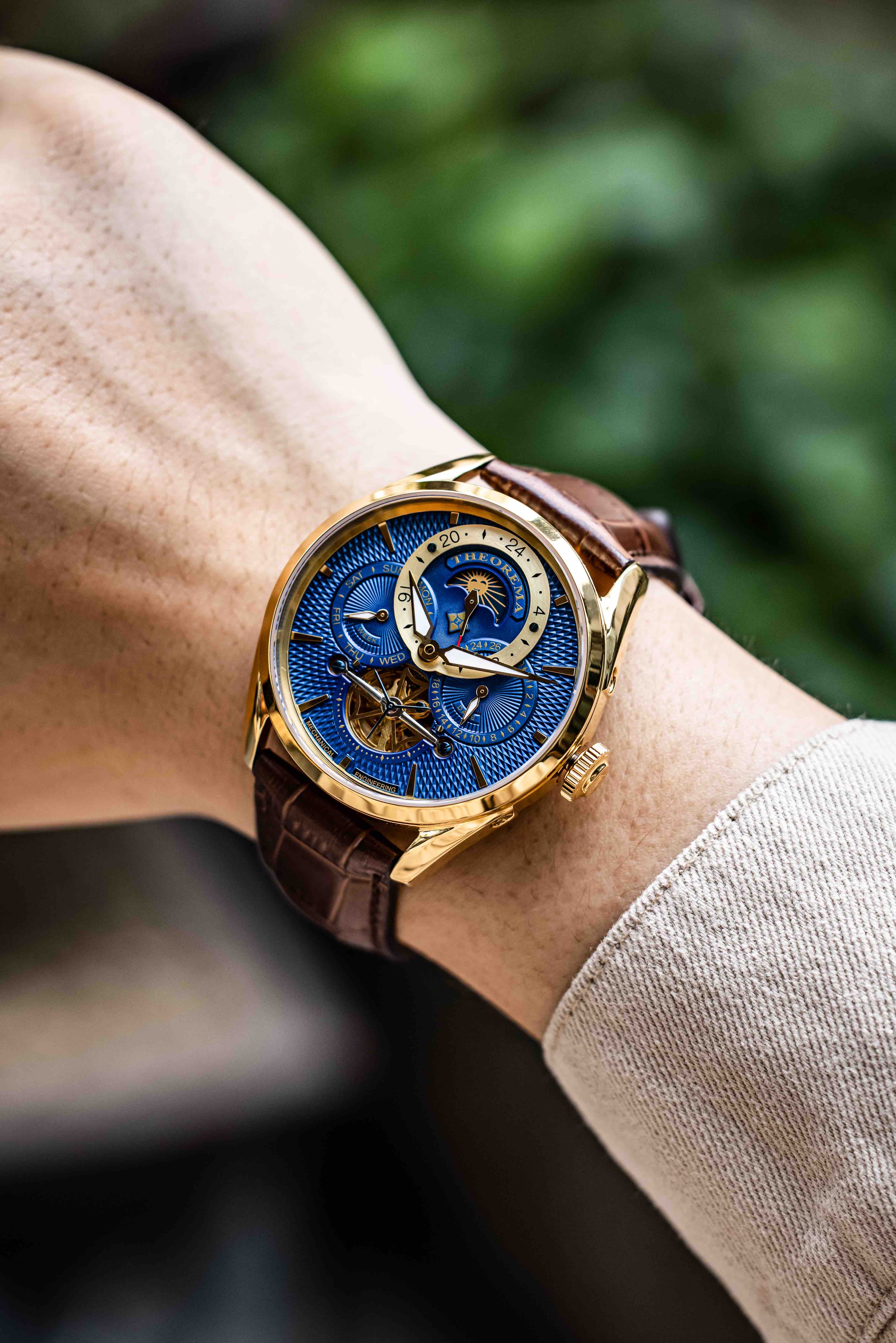 Showcasing the blue dial gold case and brown leather Vienna collection.