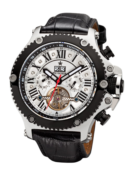 Black leather band, with a black bezel, silver case, with black buttons, and silver bullet screws on top of the case.