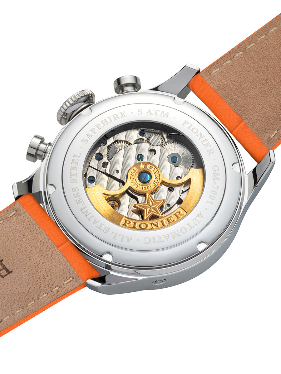 Open glass back that showcases the mechanism inside along the gold color rotor.