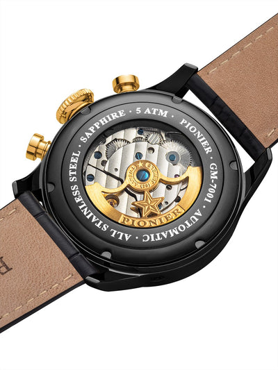 Watch with visible mechanical components and 'Pionier' branding on a white background