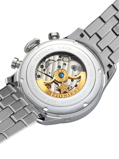 Close-up of a Pionner watch with mechanical components on a white background