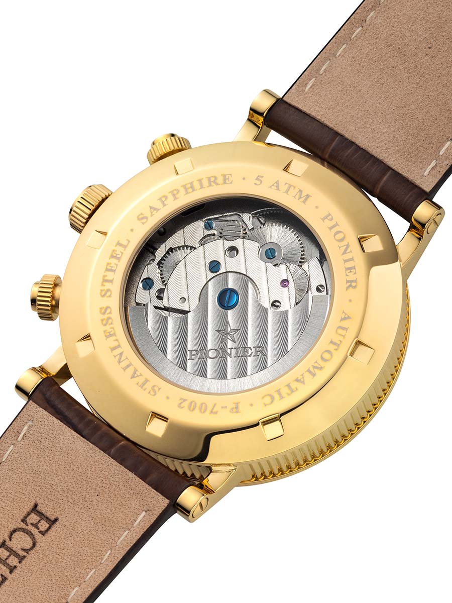 Open back case with silver color movement and standard buckle for the brown leather band.