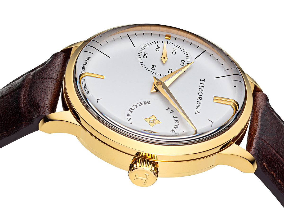 White classic dial with a gold case and brown leather band. Portofino collection.