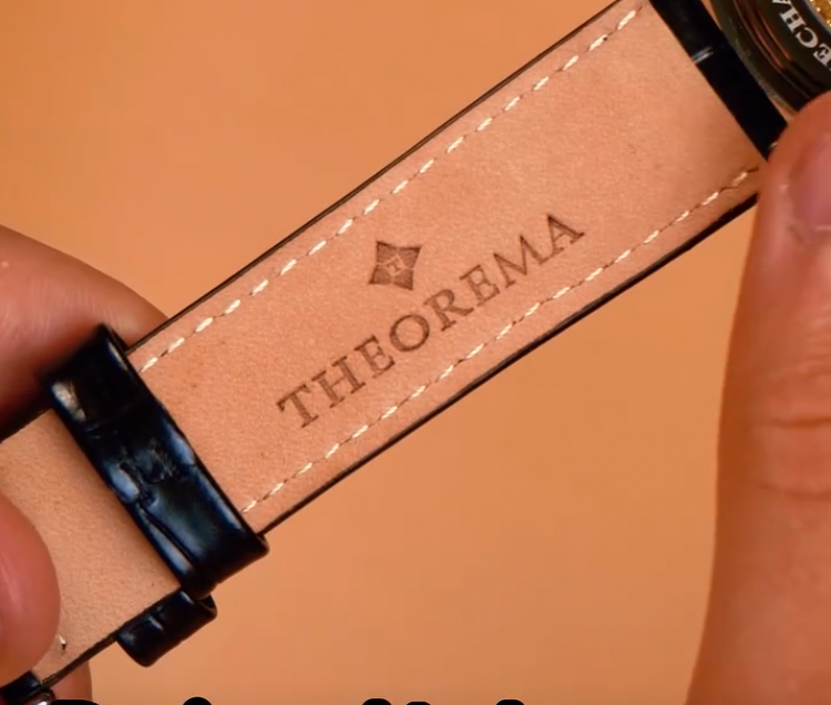 Genuine leather band with the Logo Theorema.