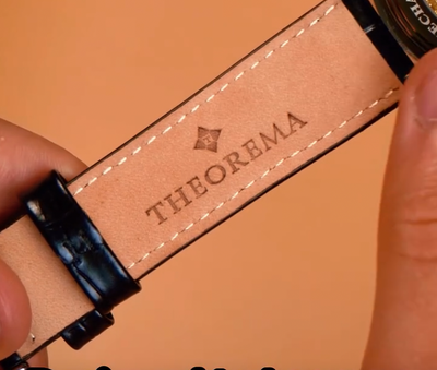 Genuine leather band with the Logo Theorema.