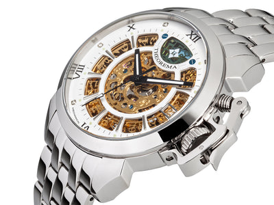 Automatic watch of gold, white, and silver color mix.