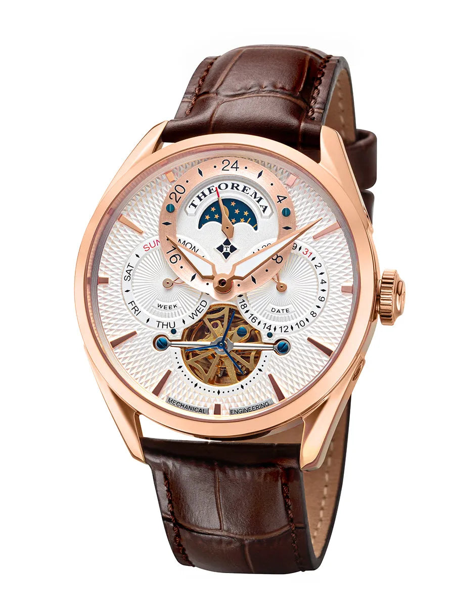 Multi-tone dial with calendar function and open heart design.