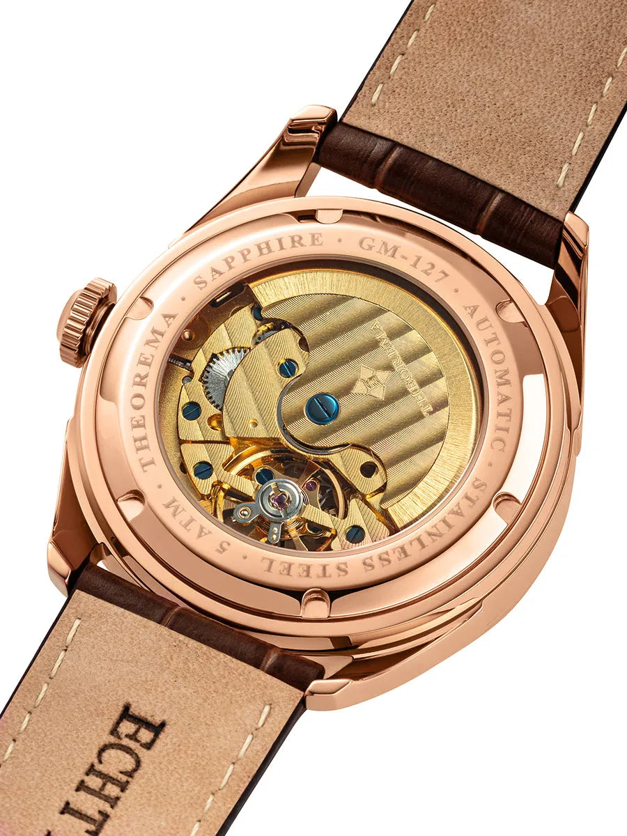 Brown leather band with open back case to view at the gold color movement.