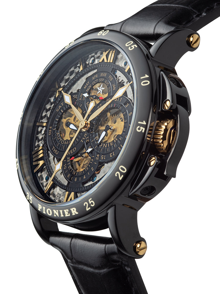 Black case with black leather and gold crown with Roman numerals.