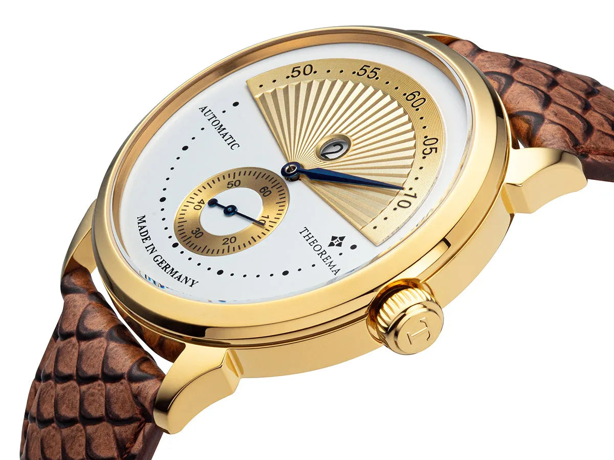 Arabic numerals watch with gold case and gold crown button.