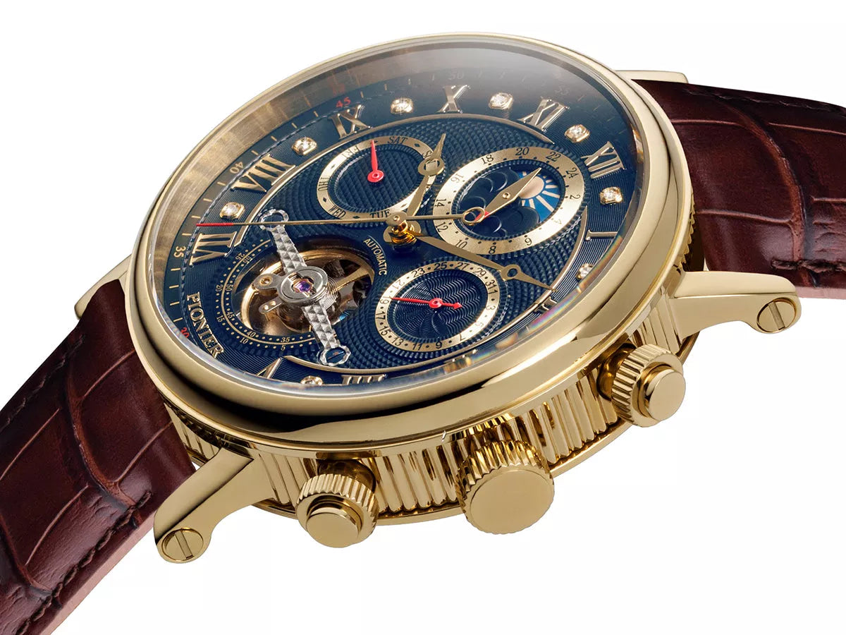 Blue dial with diamonds and Roman numerals in a gold case color.