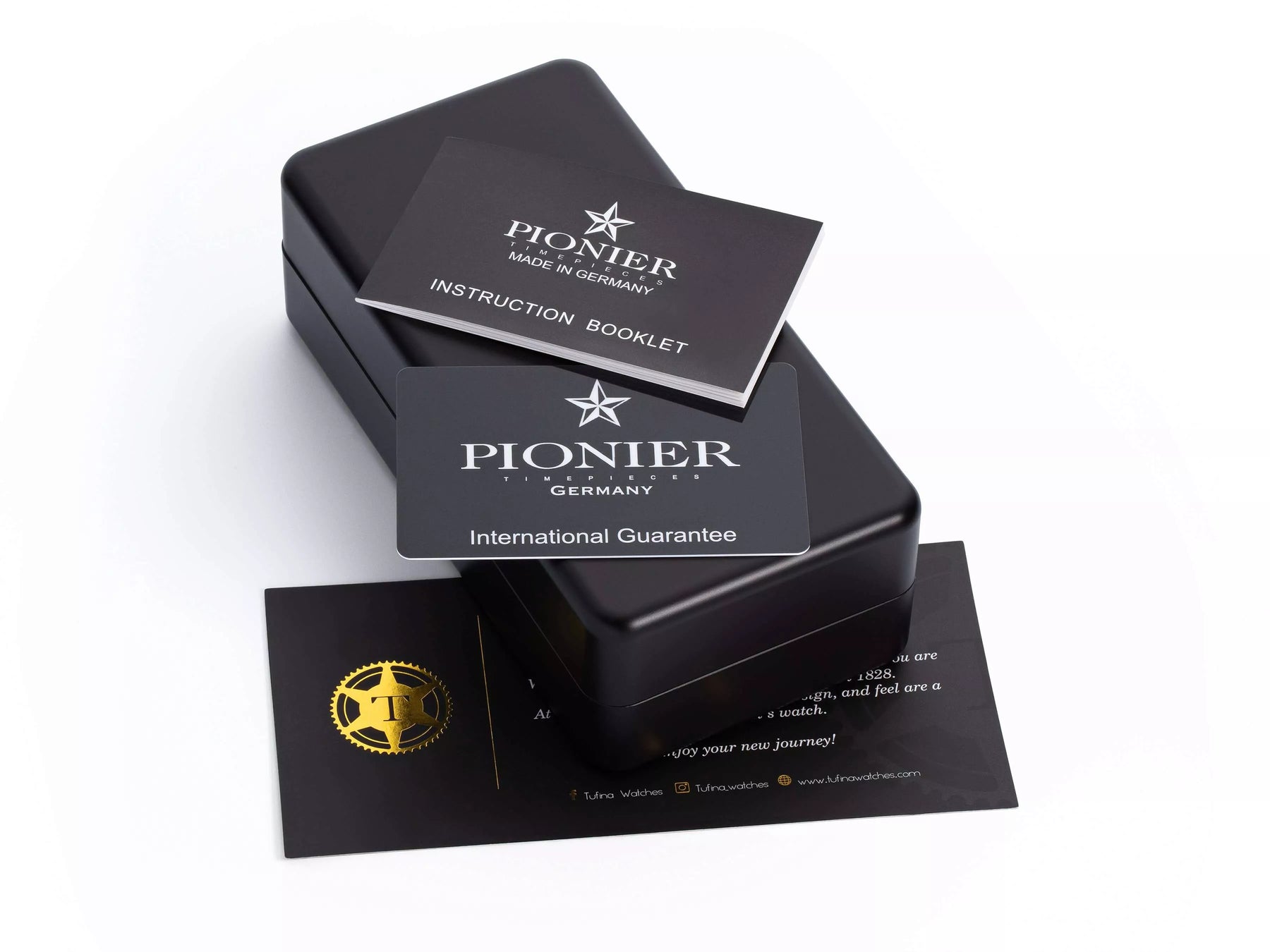 Pionier original box with instruction booklet, international warranty, and thank you card.