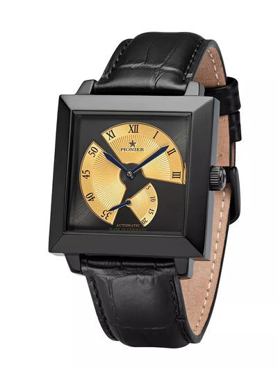 Black and gold dial with brown leather band and black case.