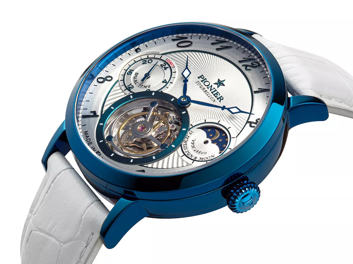 White dial with open heart design and arabic numerals with blue case.