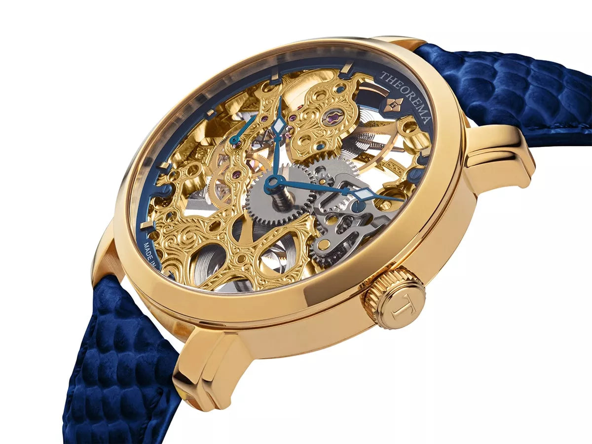 Gold dial with gold case and gold button and blue leather band.